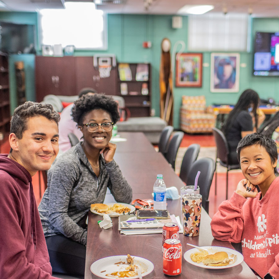 Students enjoying a meal together.