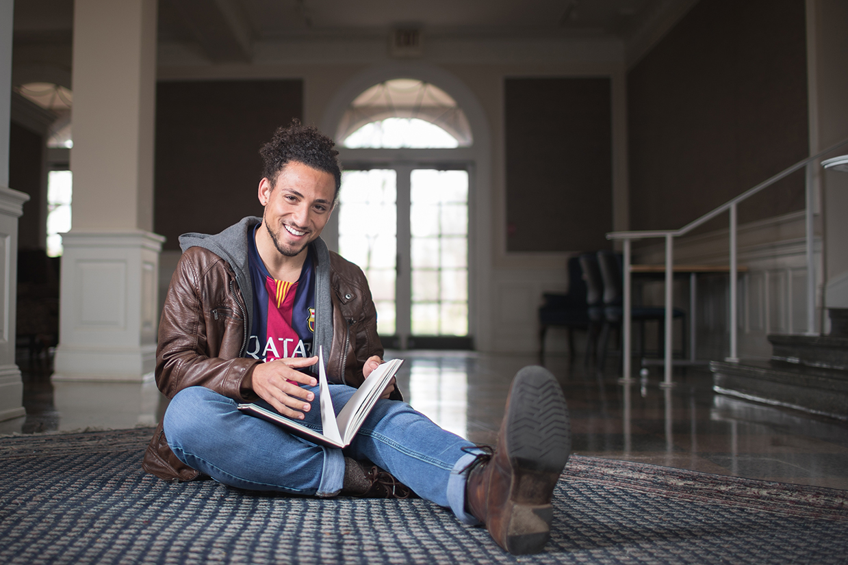 Amir Elraheb poses for photo in Harned building