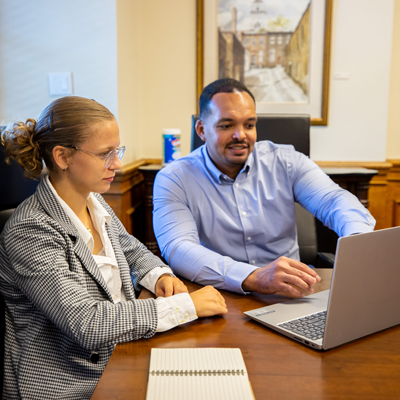 students looking at a laptop