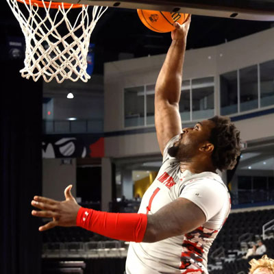 Player going for a dunk.