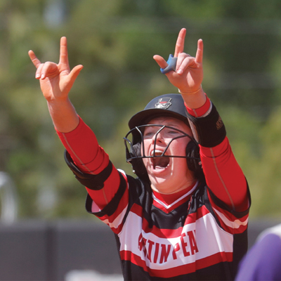 Softball player celebrating