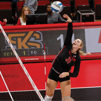 Player returning the ball over the net