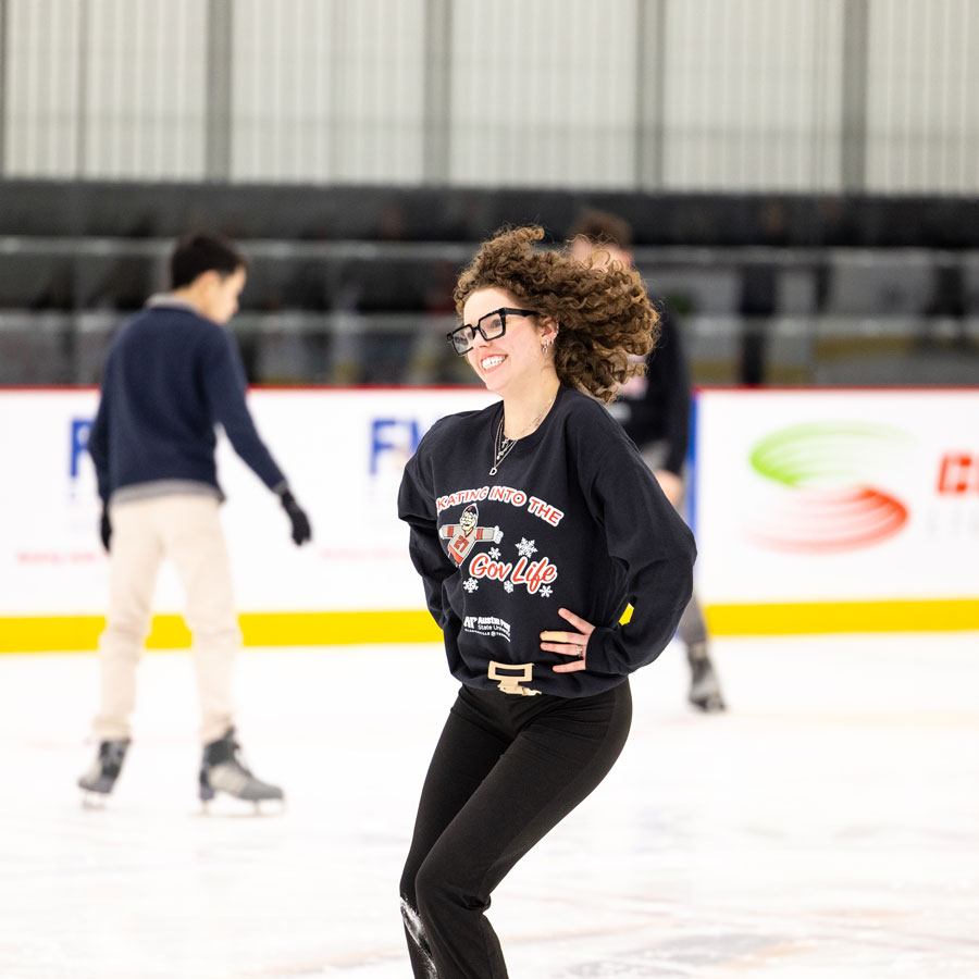 Student skating at the Ford Ice Center during a Student Life group activity.