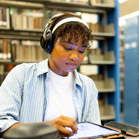 Student studying on campus