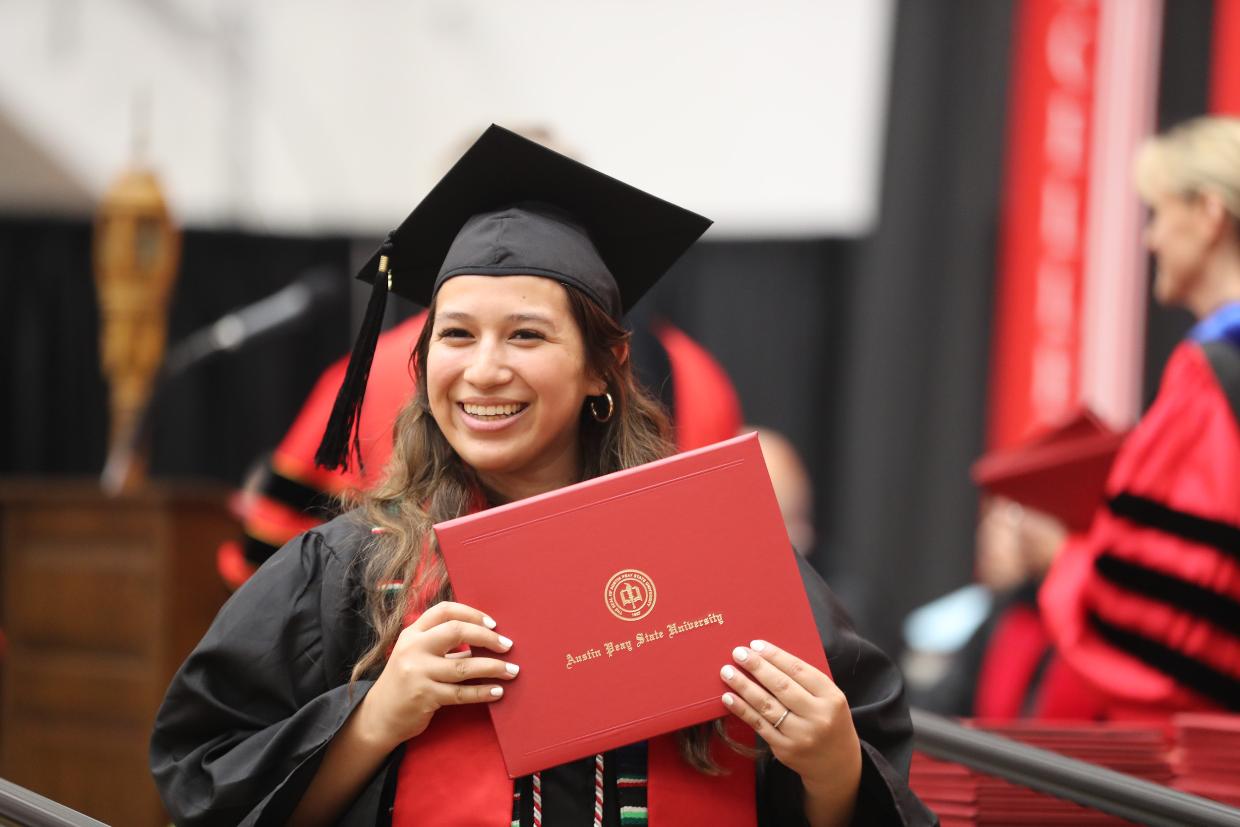 More than 600 students received degrees from Austin Peay State University this summer, and approximately 300 participated in a commencement ceremony hosted on Aug. 4 at the Dunn Center. 

Undergraduate and graduate students from all five academic colleges and the new University College’s inaugural graduating class were recognized. A full recording of the ceremony is available through APSU-TV Clarksville’s YouTube Channel.

For more information about commencement, contact the Office of the Registrar at graduation@apsu.edu or 931-221-7150.