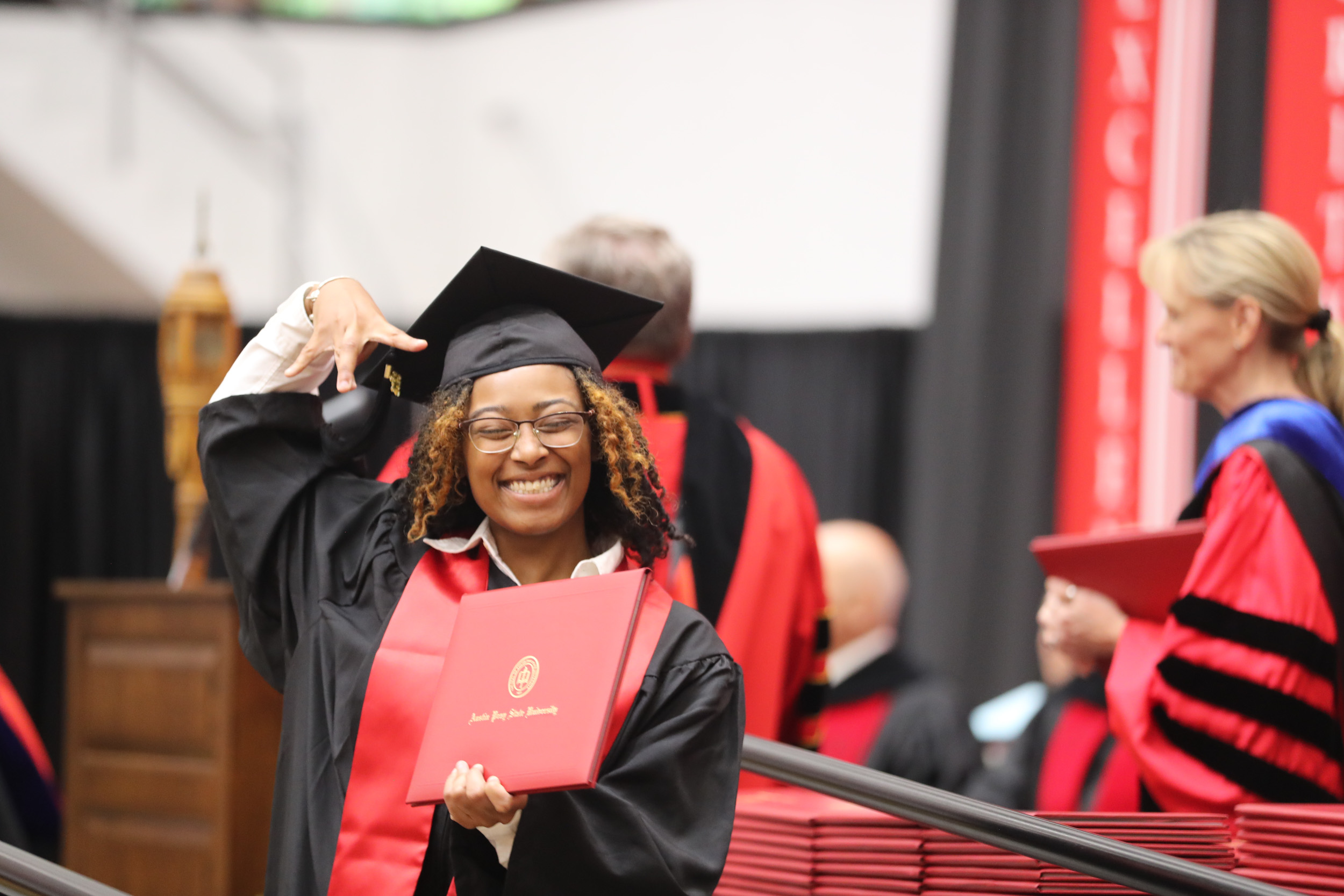 More than 600 students received degrees from Austin Peay State University this summer, and approximately 300 participated in a commencement ceremony hosted on Aug. 4 at the Dunn Center. 

Undergraduate and graduate students from all five academic colleges and the new University College’s inaugural graduating class were recognized. A full recording of the ceremony is available through APSU-TV Clarksville’s YouTube Channel.

For more information about commencement, contact the Office of the Registrar at graduation@apsu.edu or 931-221-7150.