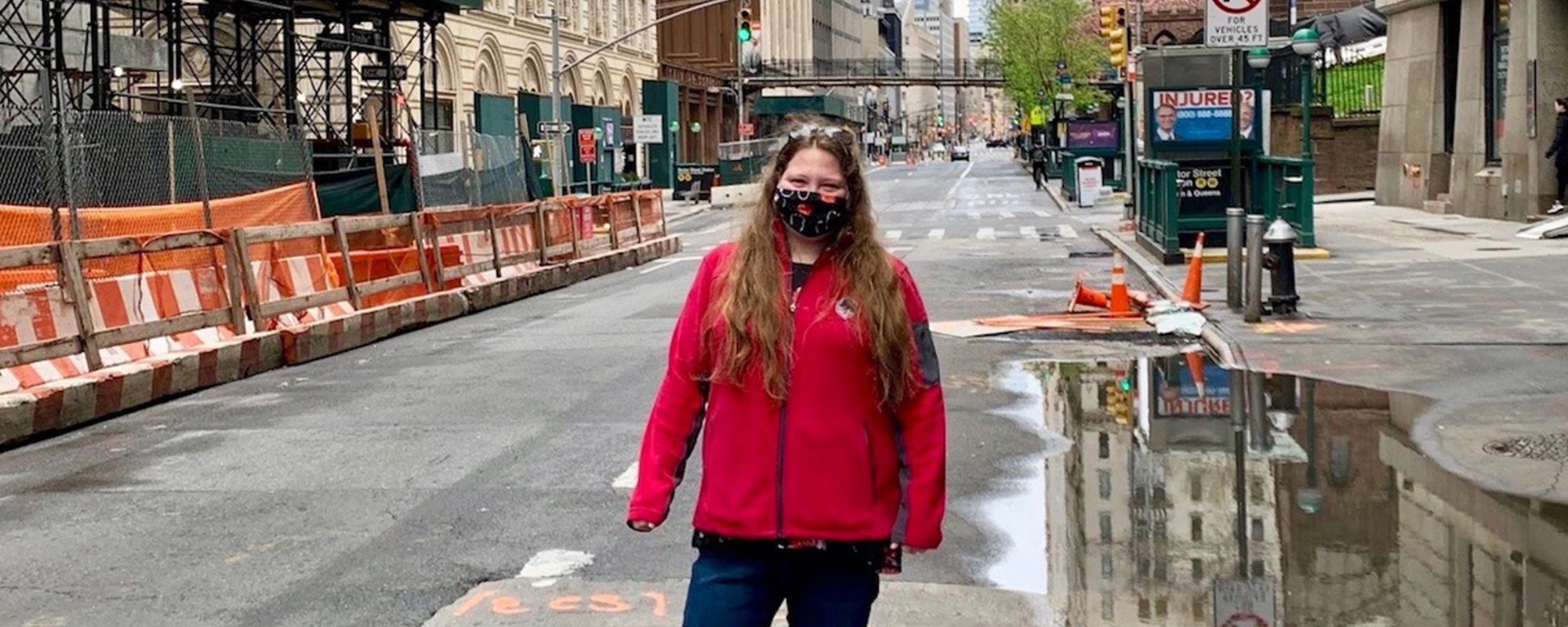 Sarah Sullivan poses in empty new york city street