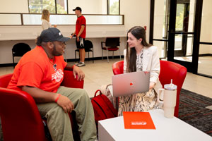 Students working with a laptop