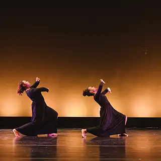 Students on stage during the Spring Dance Rehearsal.