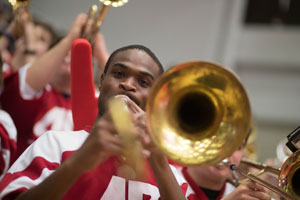 student playing with a trombone