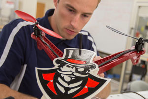 Student working with an aviation device