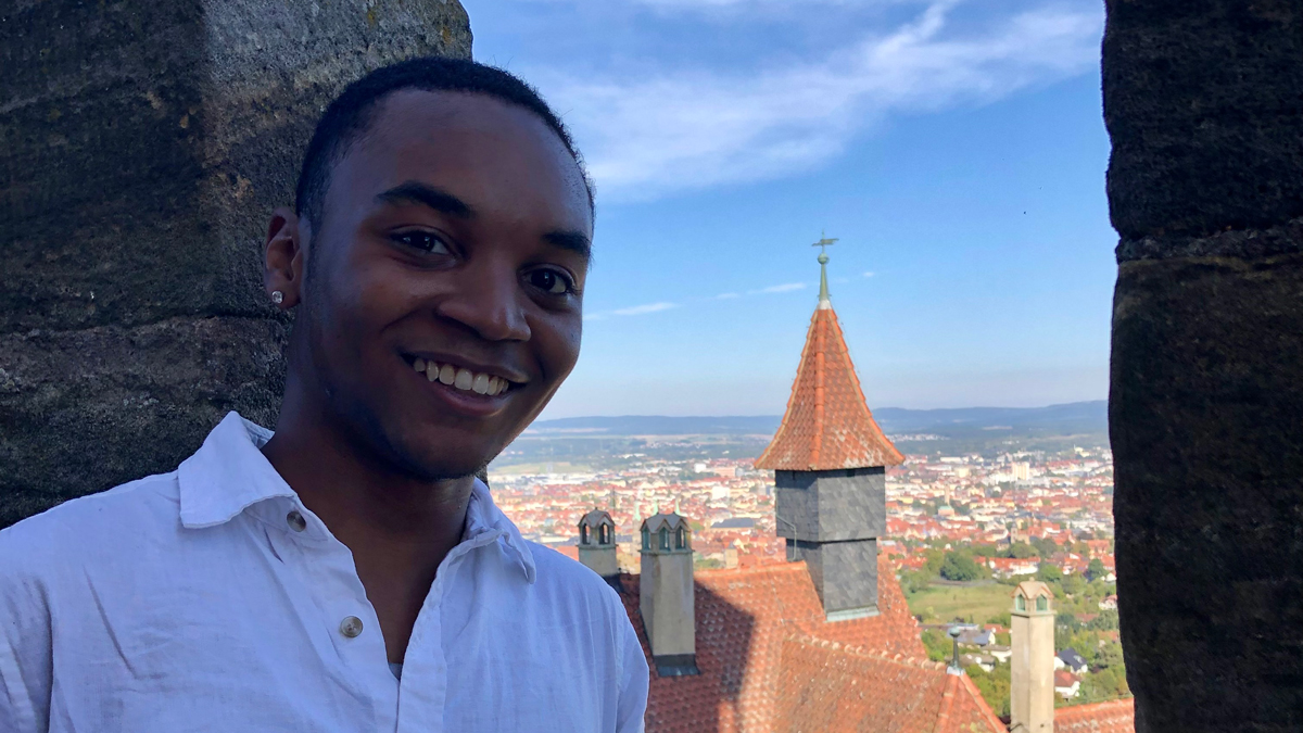 view of a student and view outside of castle window