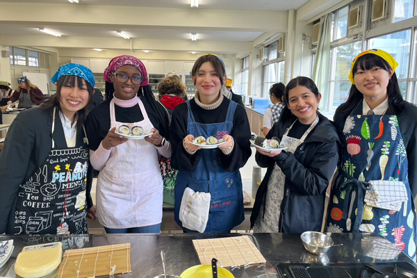 Students learning how to make sushi