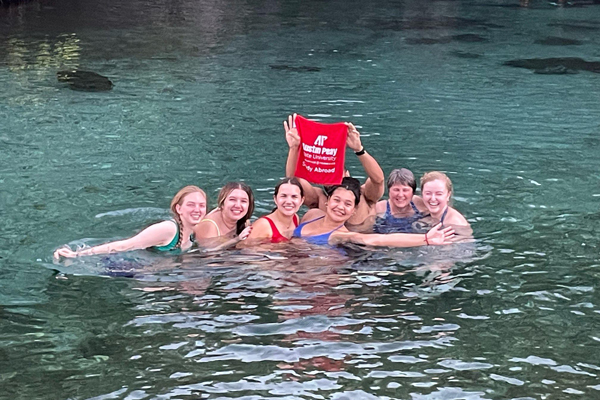 Students swimming togther