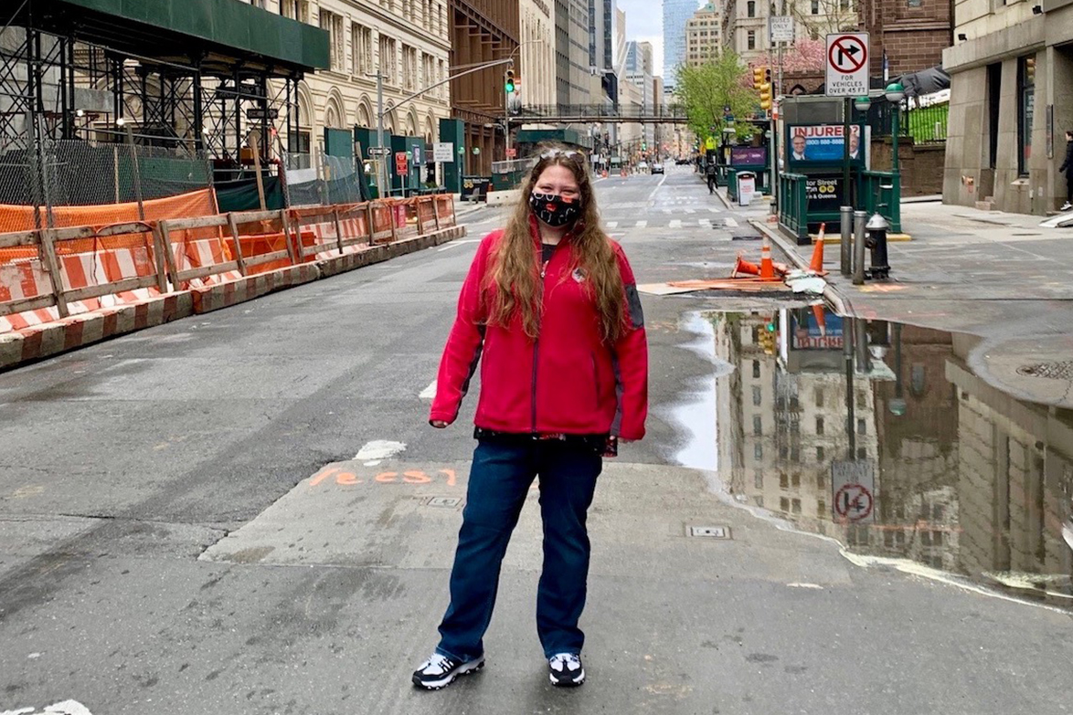 Sarah Sullivan poses in empty New York street