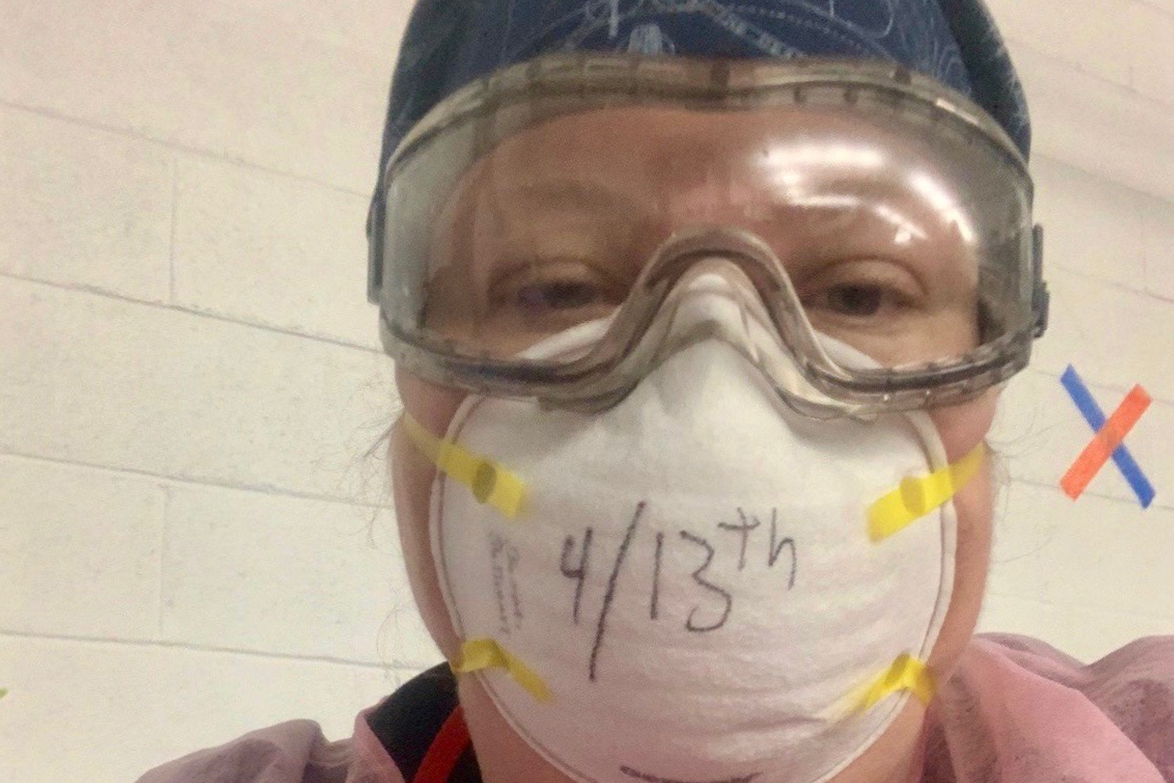 Sarah Sullivan poses with mask in hospital