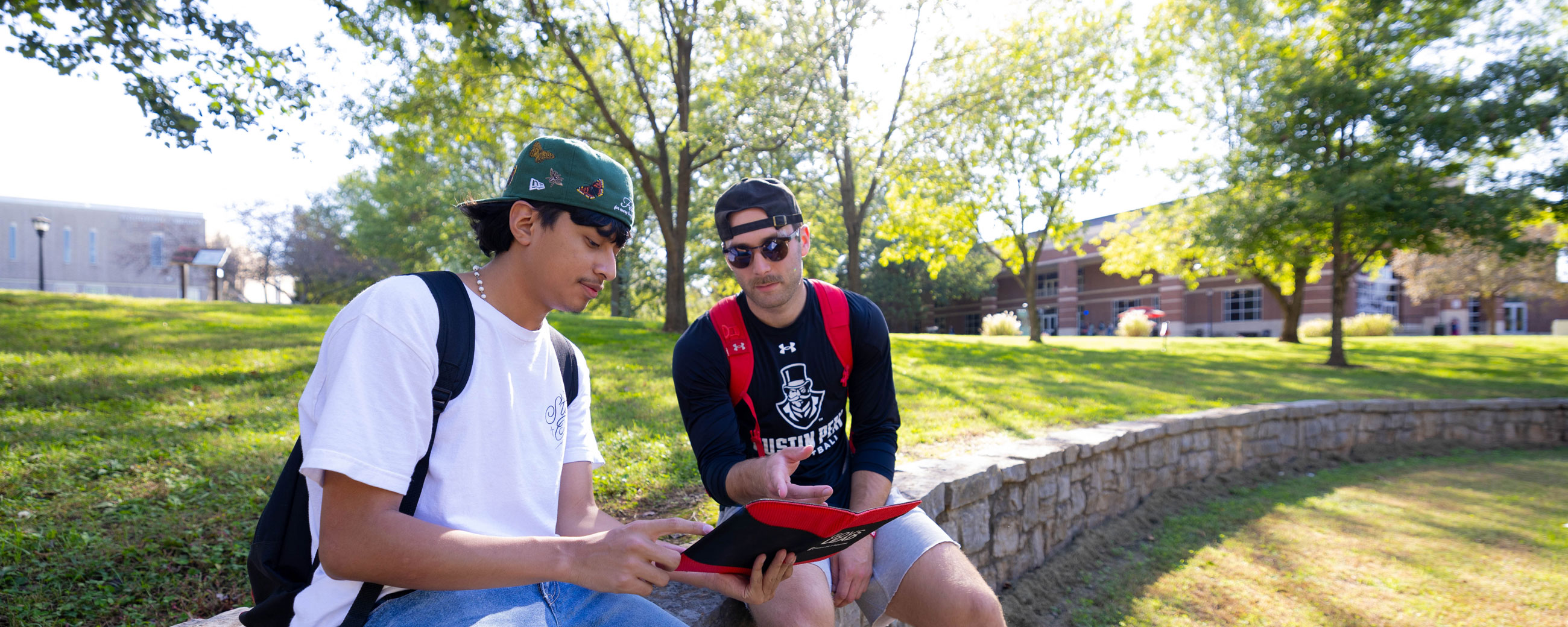 Students studying outside on campus