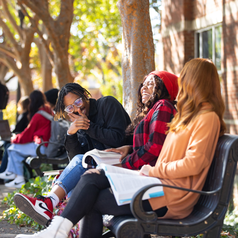 Students laughing outside the Morgan University Center
