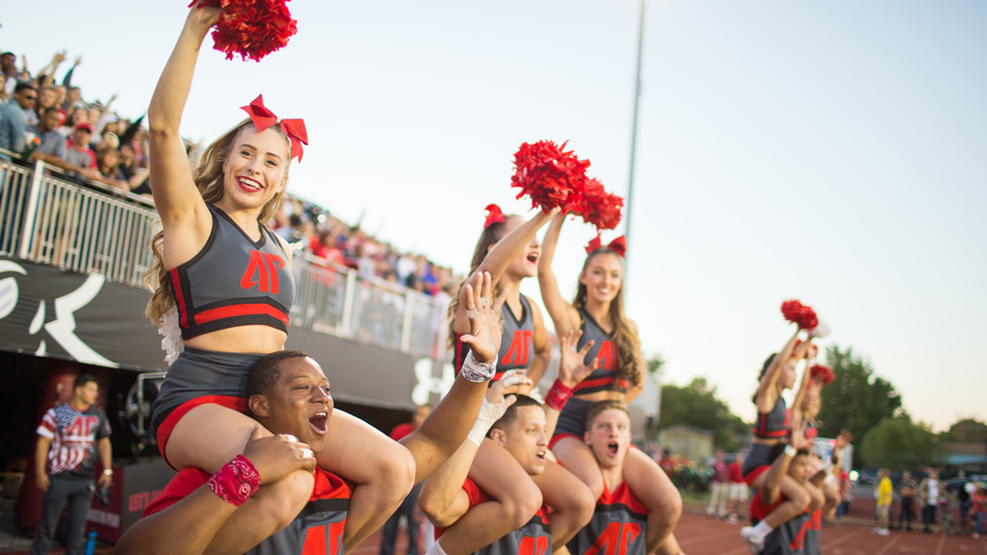 Cheerleaders cheering at a game