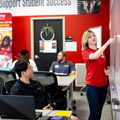 a student tutoring another inside the Learning Resource Center
