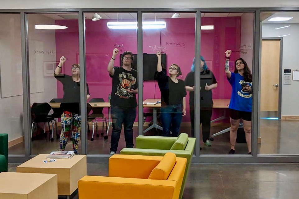 Last year's APSU team that competed in the 24 Hours Animation Contest use a glass wall to map out their ideas for the film.