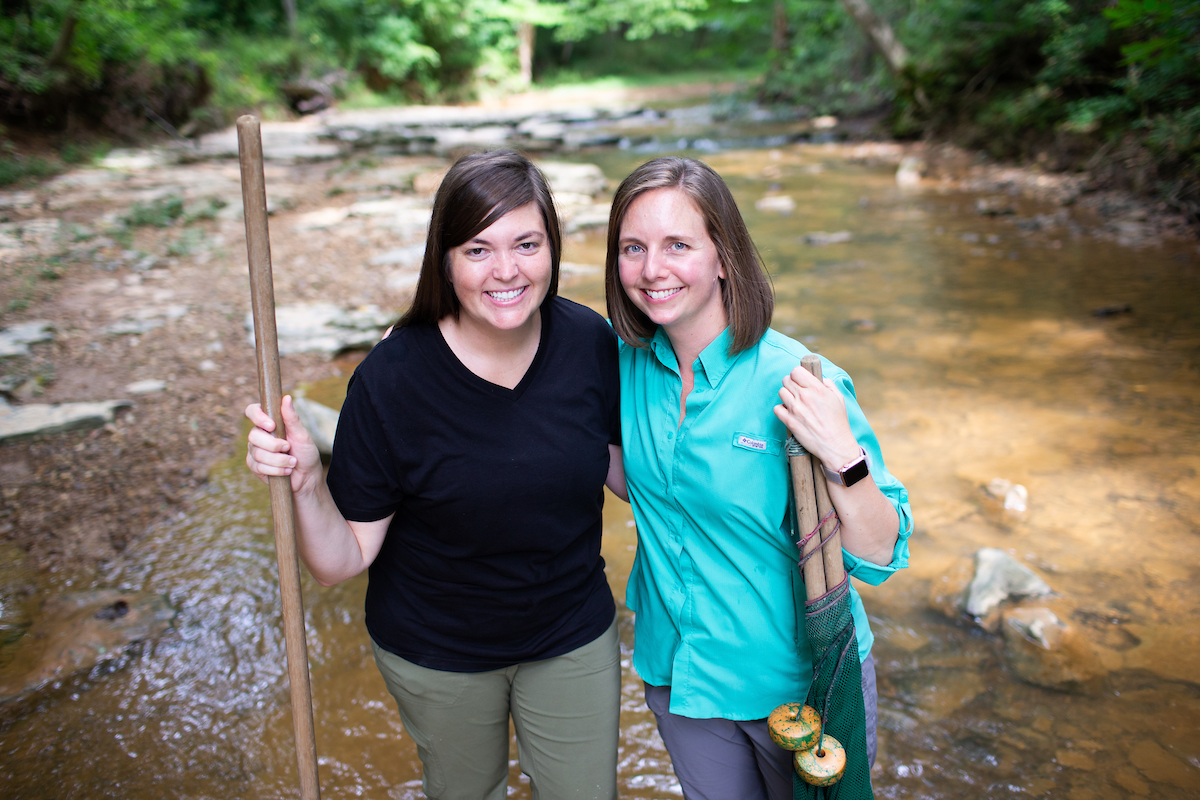 Erin Bloom and Dr. Rebecca Johansen pause while looking for crayfish.
