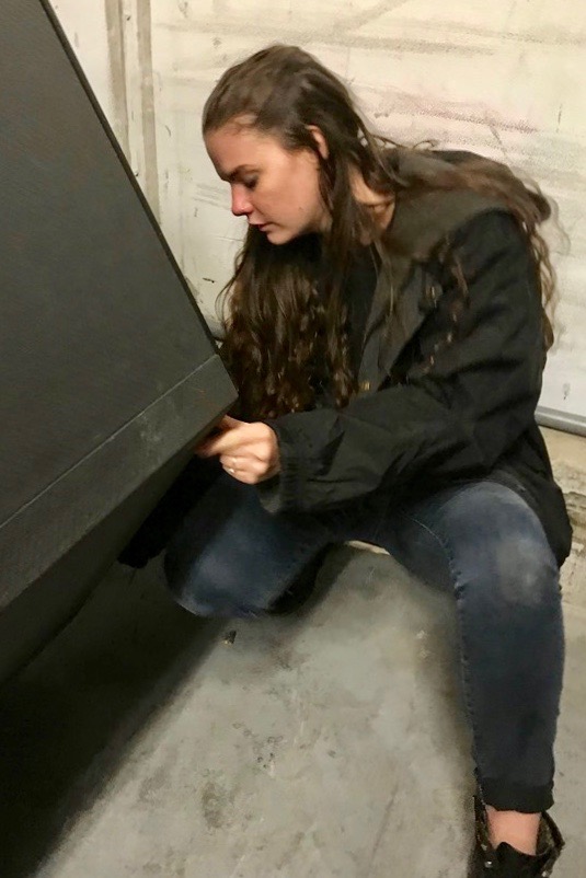 Deborah Gulledge tests the insulation on the telescope in a deep freezer in Hawaii.