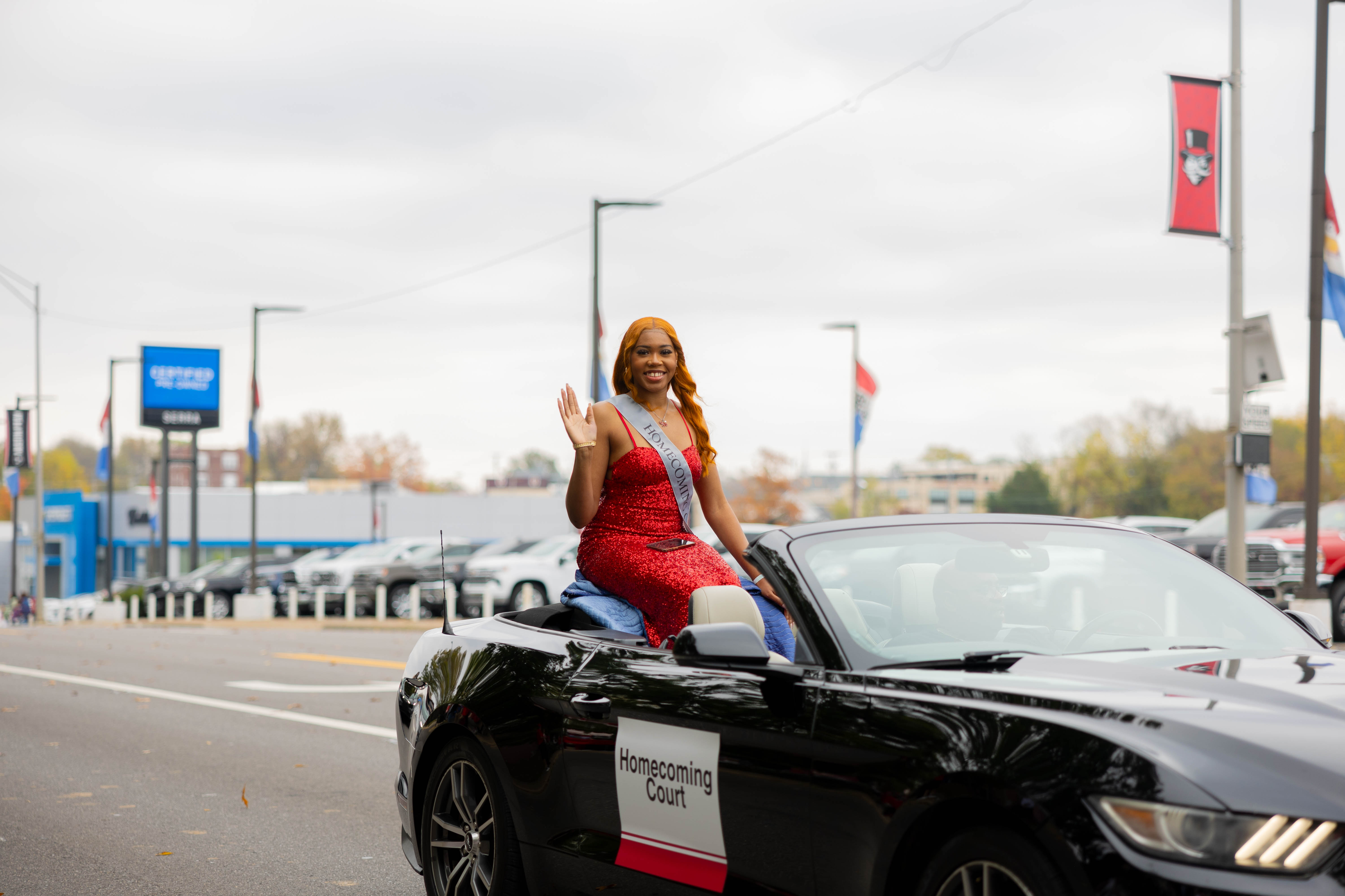 Jasmine Lewis sits in a car during the 2024 APSU homecoming parade