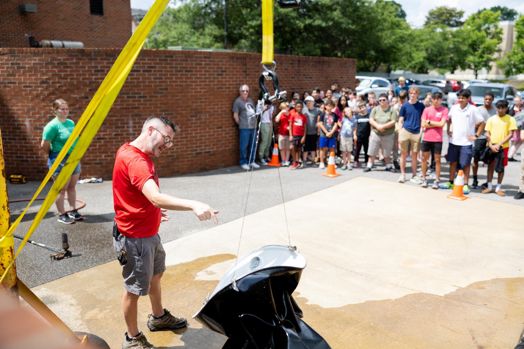 Bryan Gaither, the laboratory manager for APSU's Department of Physics, Engineering and Astronomy, conducts a barrel crush. 