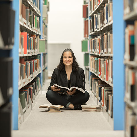 Psych major Natalie Castillo sits in library