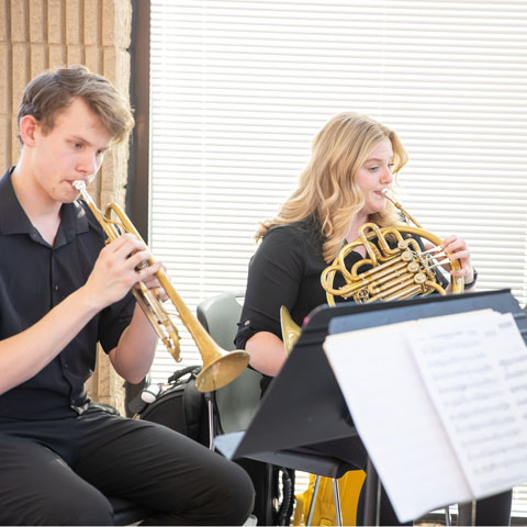 Instrumental students playing during concert