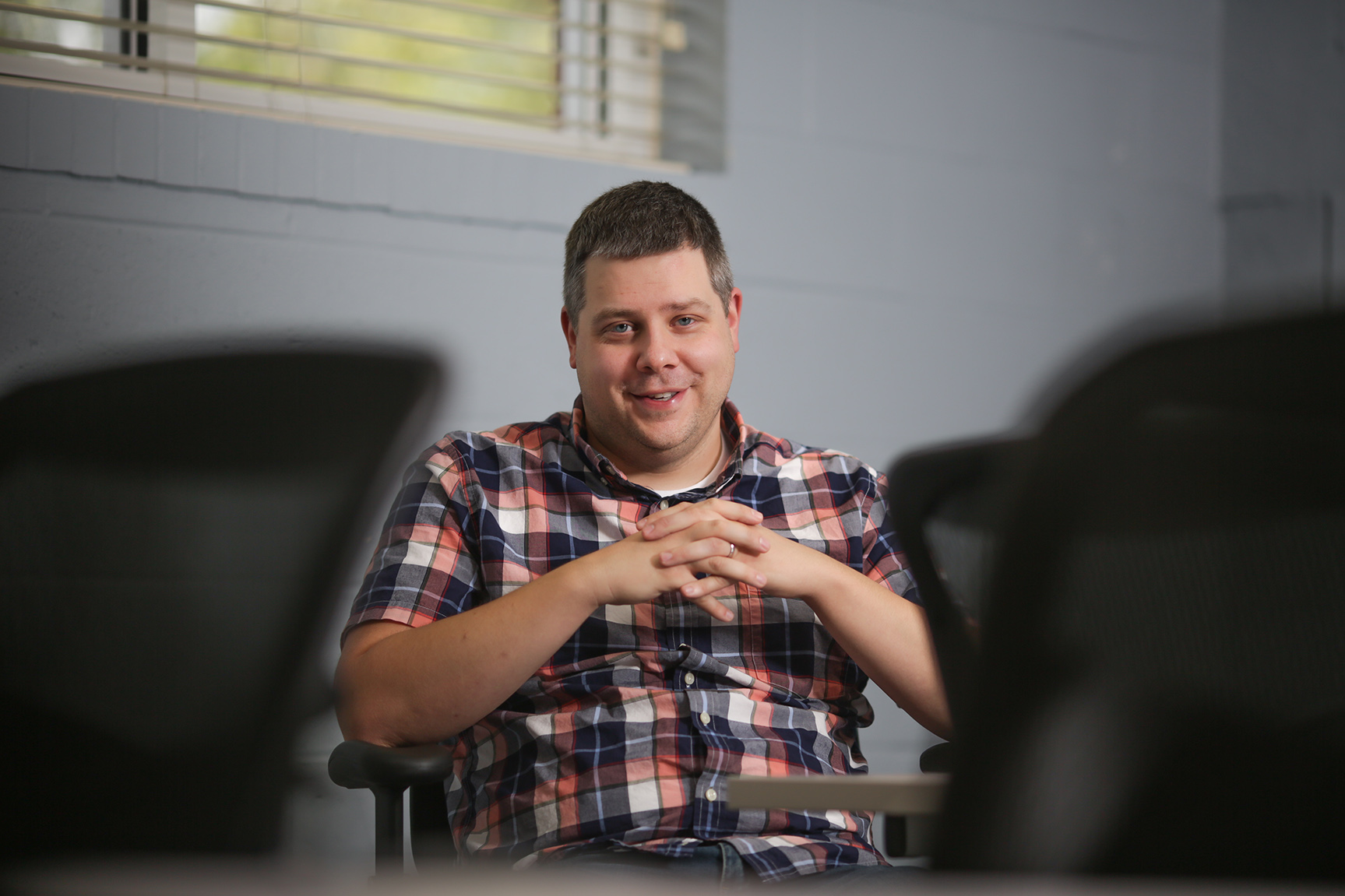 Robert Baron poses in comm class