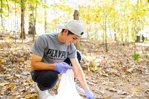 Student pciking up litter